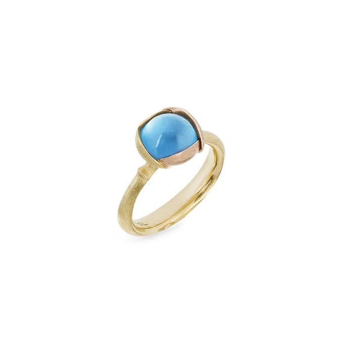 Lotus ring i 18kt rødguld med sky blue topas